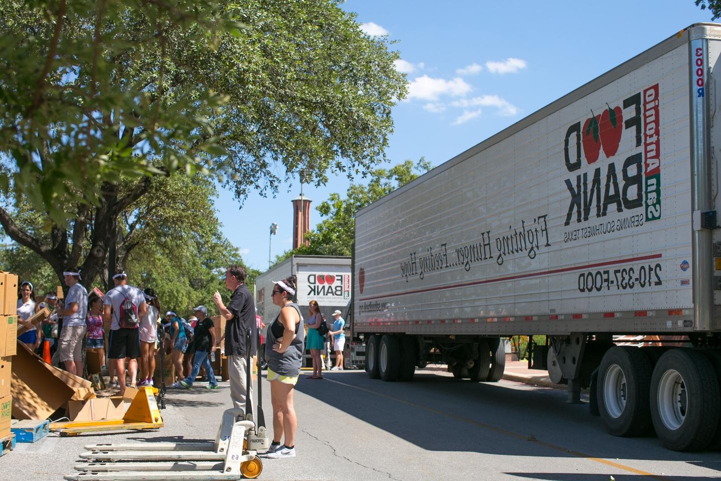 Food Bank truck arriving for alumni event.