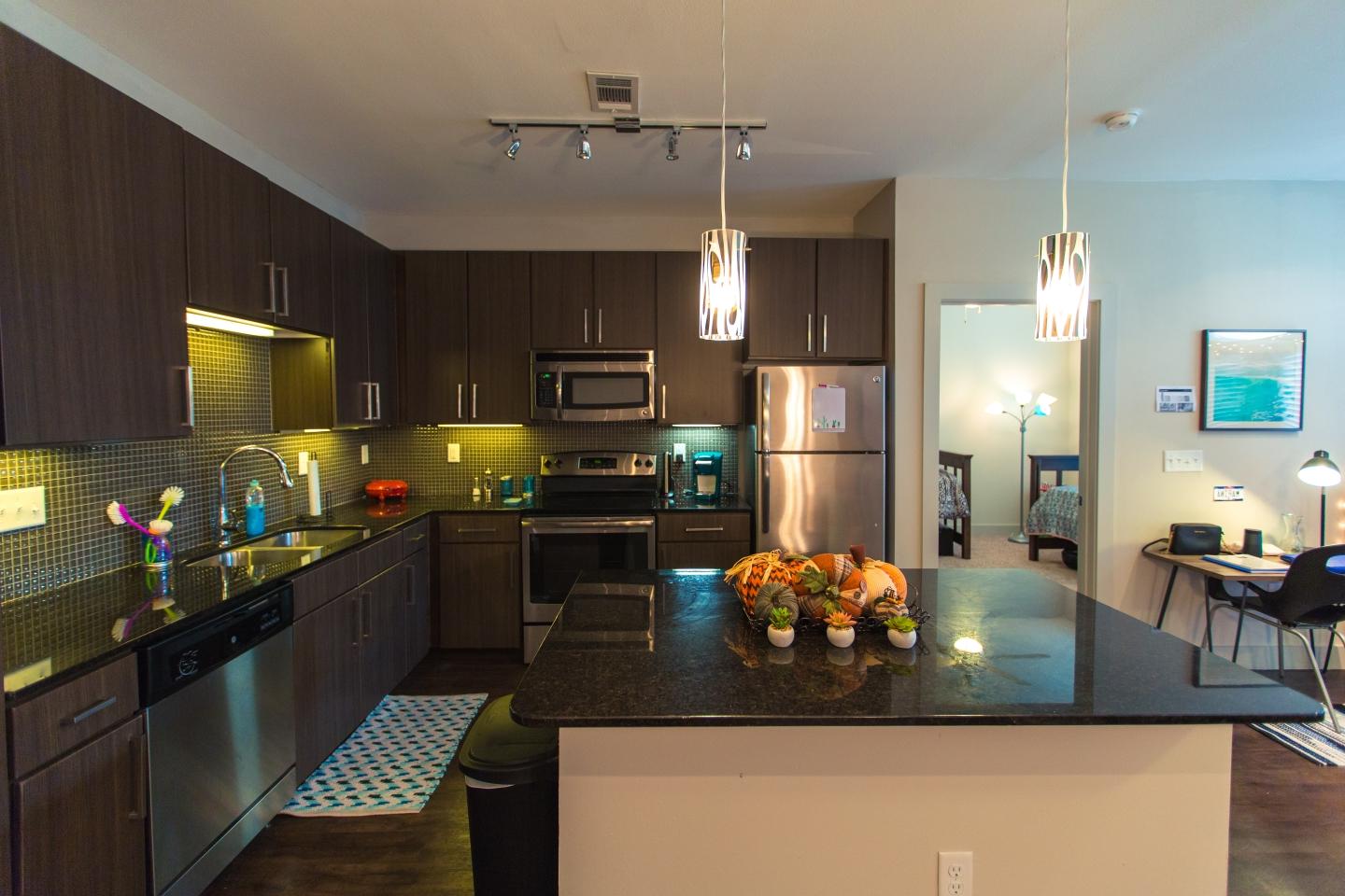 Decorated kitchen area in a City Vista apartment